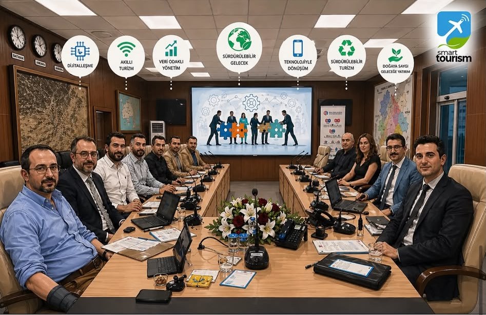 Deelnemers rond een grote tafel tijdens een vergadering van het Smart Tourism-project